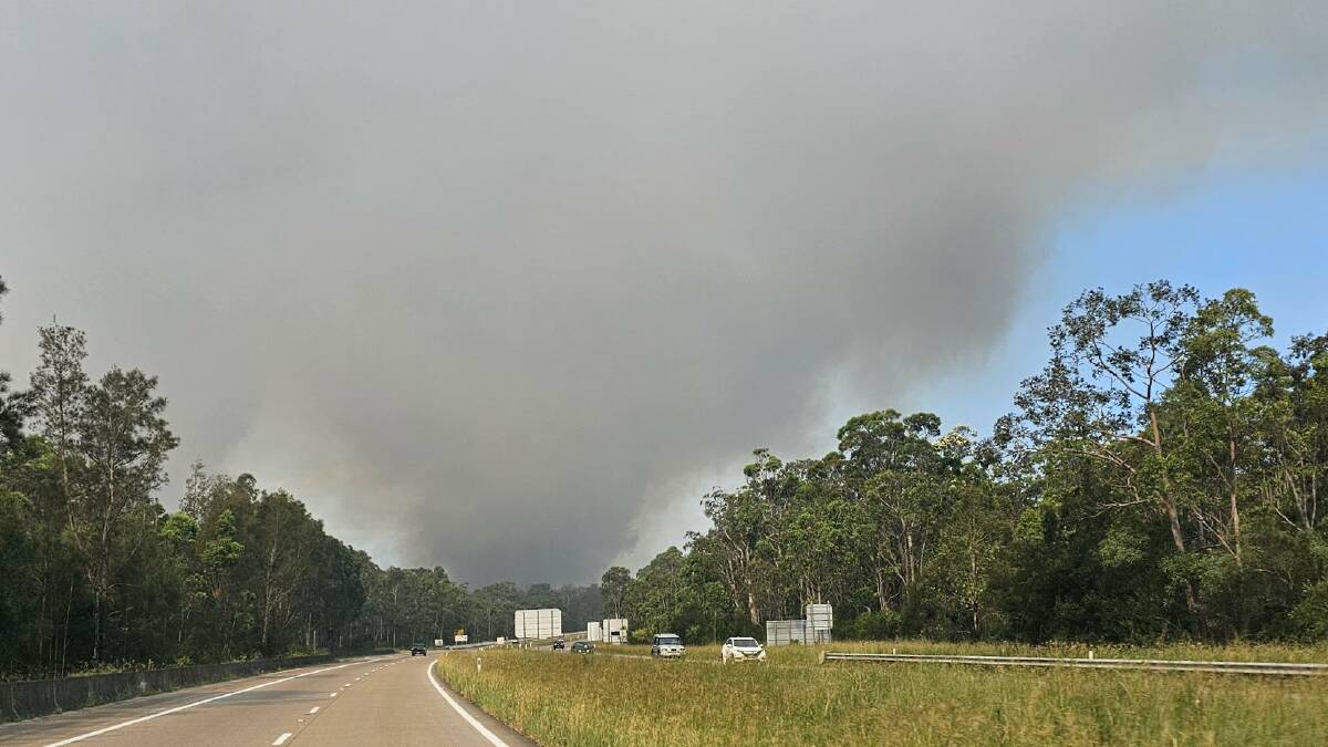 Pacific Highway fire still afoot and fuelled by Hunter heatwave warning