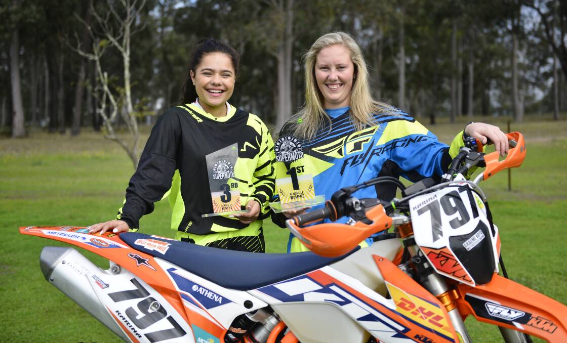 RIGHT STUFF: Keegan Pickering and Karina Bailey are great mates after taking part in the Asian SuperMoto in Newcastle. Picture: Michael Hartshorn