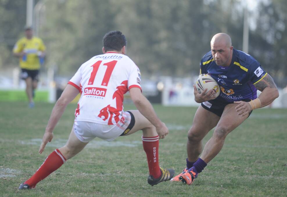 TOUGH DAY: Cessnock centre Shaun Metcalf goes on the attack. Picture: SAGE SWINTON