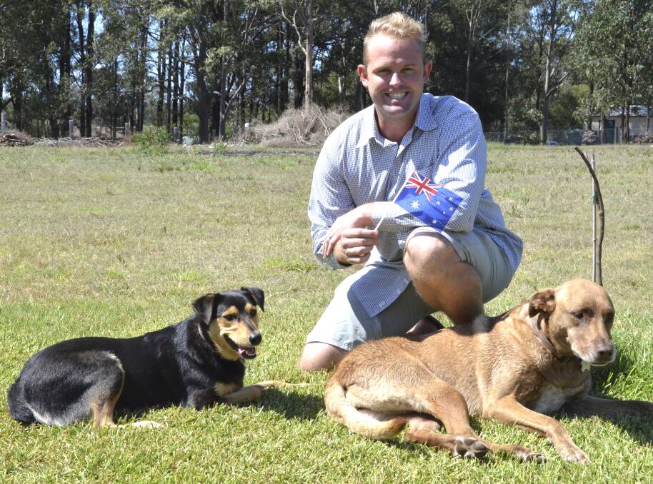 SPECIAL DAY: Pictured with his dogs Bernie and Tese, Mark Chernoff will become an Australian citizen at Cessnock's Australia Day ceremony on Thursday.