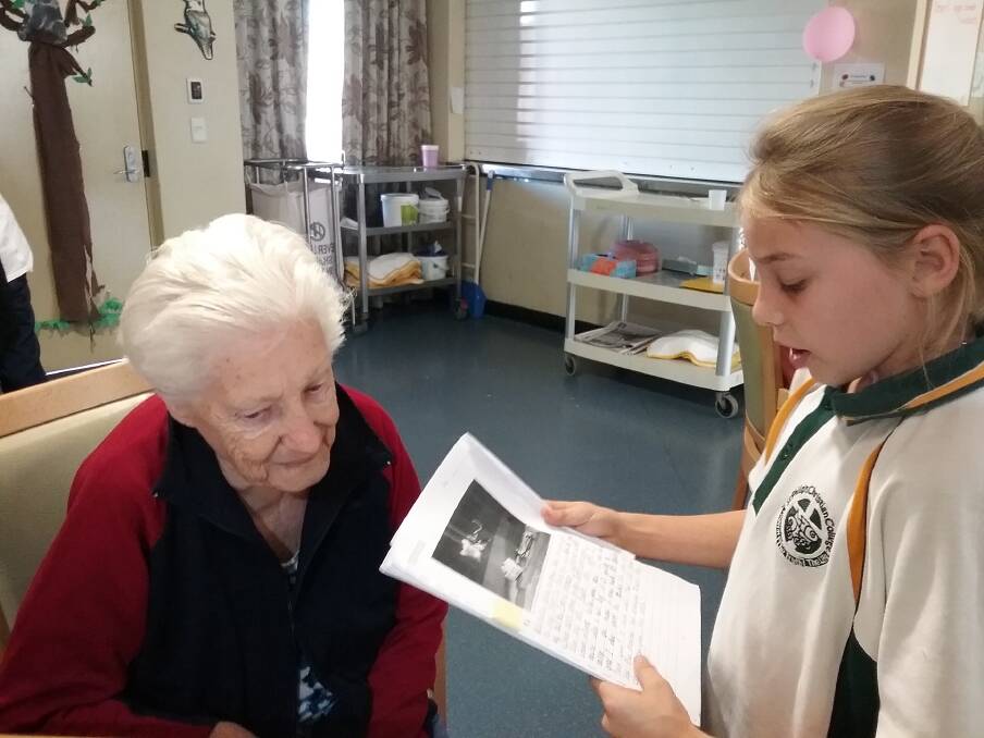 BOND: Calvary Cessnock Retirement Community resident Anne Sturrock with St Philip’s Christian College student Abby Ward taking part in the Young At Heart program.