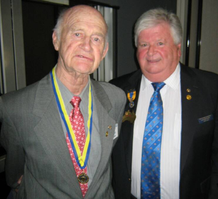 HONOUR: Rotary Club of Kurri Kurri Sunrise charter president Don Brown and past District Governor Greg Bevan, who presented Don with his Paul Harris Fellow award.
