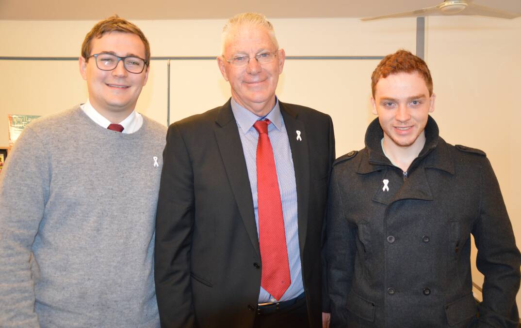 LEADERS: Cessnock mayor Bob Pynsent with former Mount View High School students Jordan O'Brien and Murray Thompson, who were instrumental in establishing the White Ribbon pledge at the school. 