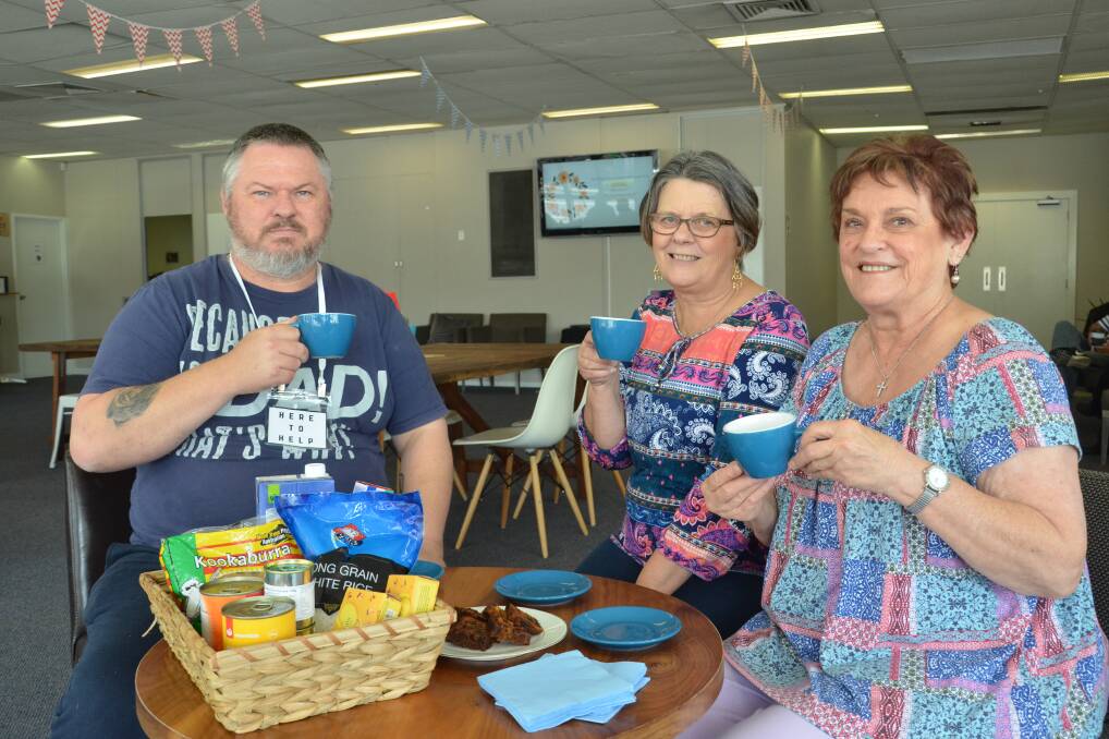 CUPPA FOR A CAUSE: Hope Valley Church members Martin Howells, Denise Townley and Jen Adams planning for the Spring Morning Tea this Friday.