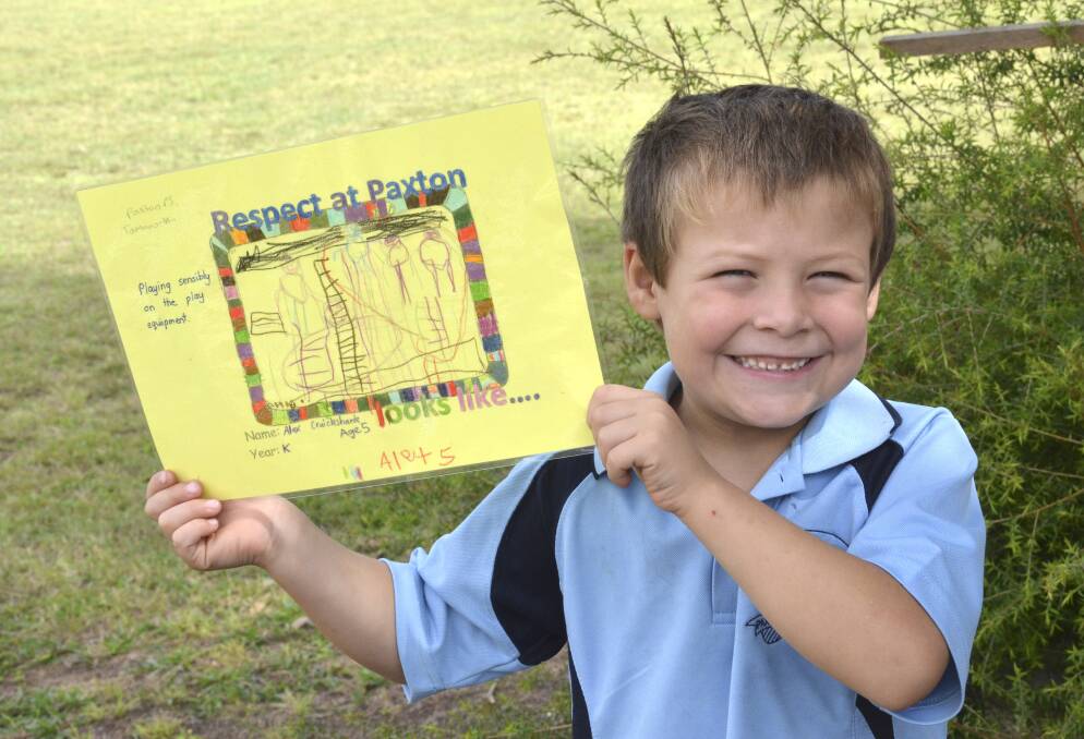 MESSAGE: Paxton Public School student Alex Cruickshank with his poster for Interrelate's Say No To Bullying poster competition. Picture: Krystal Sellars