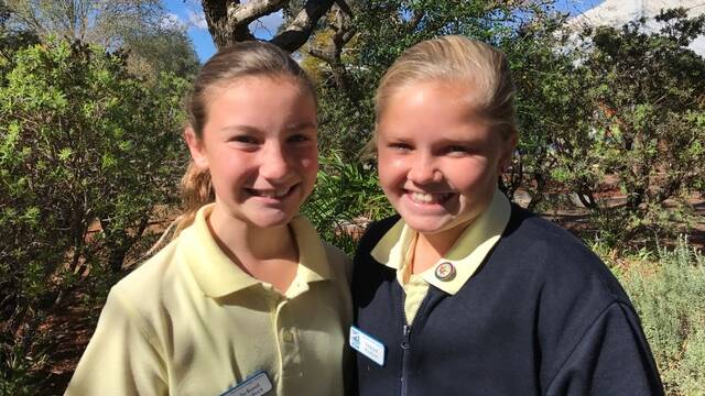 CARE AND COMPASSION: Kurri Kurri Public School students Hayley Mossman and Charlotte Childs are among this year's Fred Hollows Humanity Award recipients.