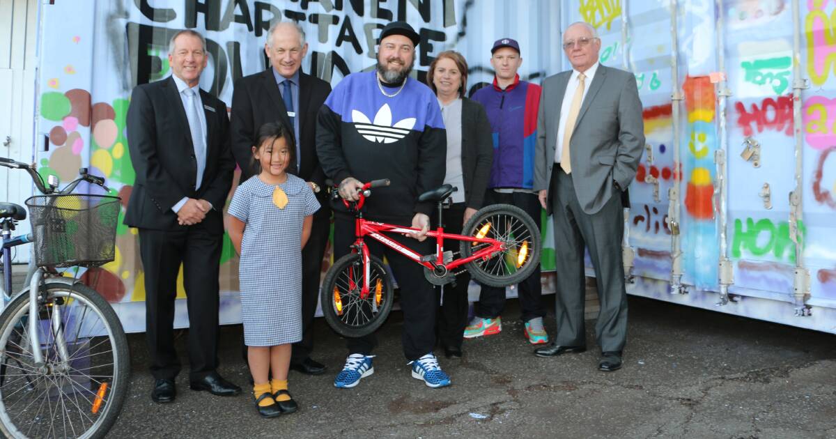 PRACTICAL: Pictured at the Wheels for Hope bike shed opening at Kurri Public School, David Shanley (Newcastle Permanent Charitable Foundation), Bella Moran (Centre for Hope family member), Geoff Walker (Newcastle Permanent Building Society), Doel (Centre for Hope volunteer), Anne Ninness (NPBS), Austin Schroder (Centre for Hope volunteer) and Michael Slater (NPCF chairman). Picture: SUPPLIED