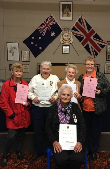 DEDICATED: Cessnock RSL Women's Auxiliary members (back row) Lorraine Rutherford, Zelma Lomas, Joyce Stephens and Carmel Potter and at front, Margaret Jackson, with their long service certificates. Absent, Flo Leary. Picture: supplied