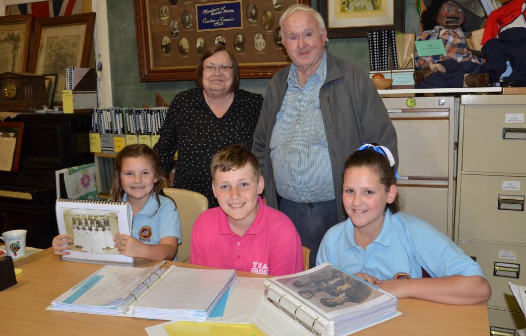 HISTORY: Back, Coalfields Heritage Group volunteers Margaret Summerville and Brian Andrews, and at front, Pelaw Main students Eliza, Reegan and Andie Summerville.