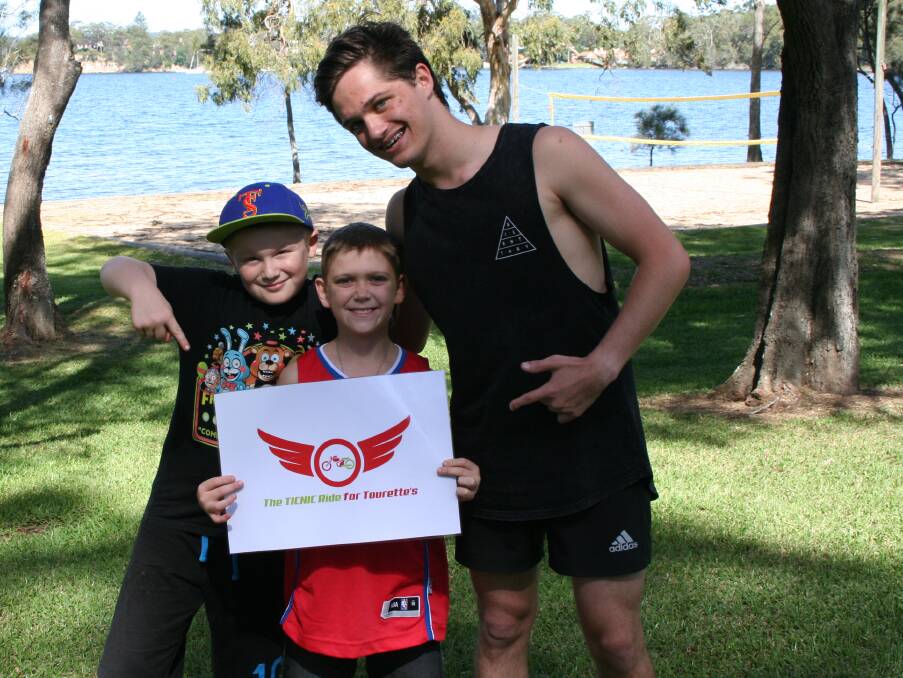 SHARING EXPERIENCES: Bailey Whitcombe and Cameron Schubert with Tourette Syndrome ambassador Adam Ladell (from The Voice 2016) at the Tourette Syndrome Association of Australia camp in April 2017. Picture: supplied