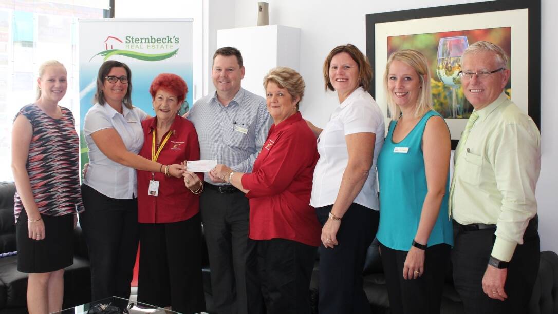 DONATION: Sternbeck's Real Estate staff hand over the cheque to Westpac Rescue Helicopter Support Group representatives Patsy Black and Betty Cordowiner.