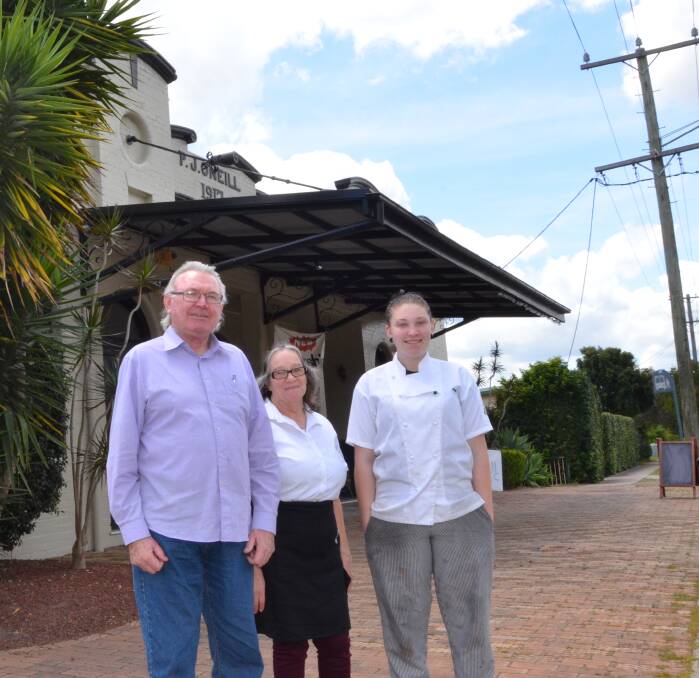 MILESTONE: PJ's on Wollombi owners Paul and Gaye Hocking and their daughter Paige invite the community to join the building's 100th birthday party.