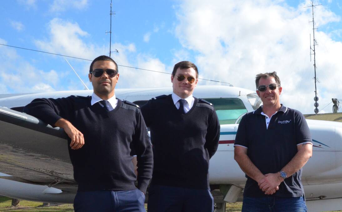 DREAM OPPORTUNITY: DreamSky Aviation trainee pilots Robert Wright and Buen Jacobsen and general manager David Coughtrie at Cessnock Airport. Picture: KRYSTAL SELLARS