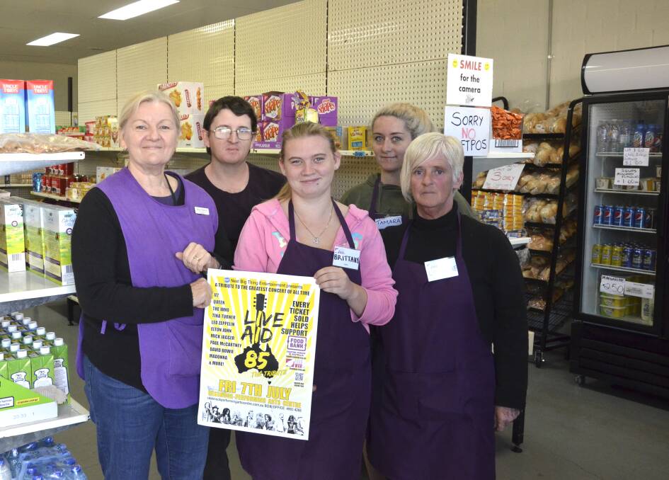 HELPING HAND: The Food War Cessnock team members Shez Munro, Corey Saunders, Brittany Ryan, Tamara Pashley and Lorraine Bates are excited about the Live Aid tribute concert's support for their organisation.