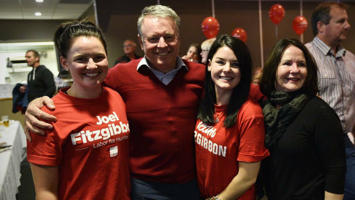 Hunter MP Joel Fitzgibbon, with daughters Caitlin and Grace and wife Diane at his post-election function at Stonebridge Golf Club on Saturday night. Picture: PERRY DUFFIN
