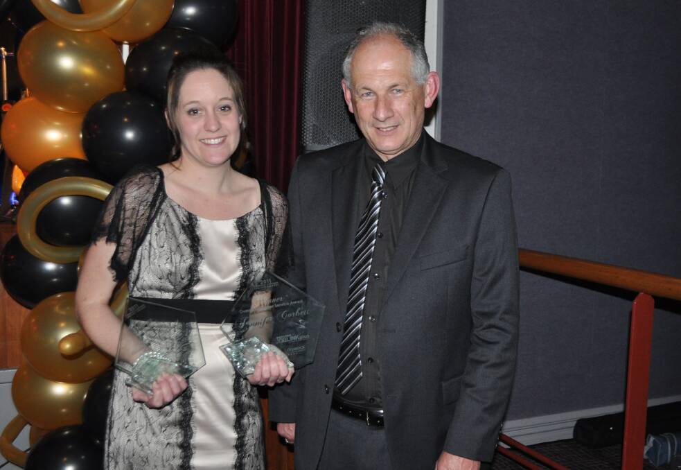 2011: Overall winner Jennifer Corbett with Cessnock Chamber of Commerce president Geoff Walker.