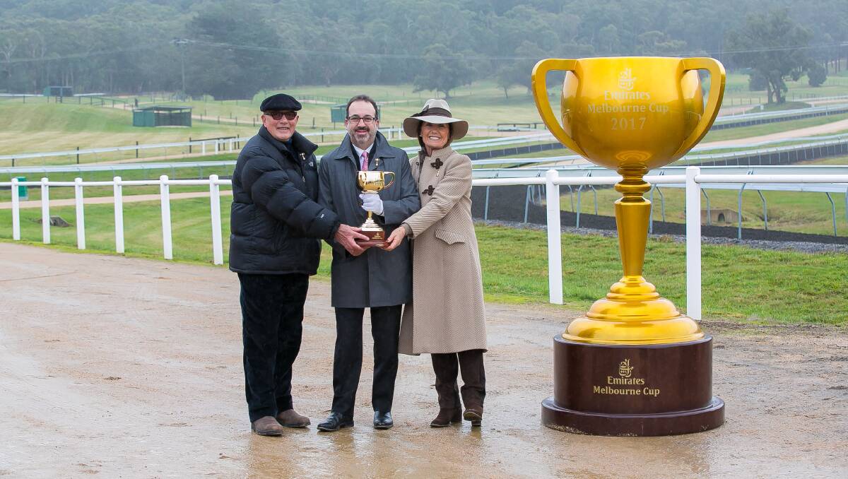 EXCITEMENT: 2016 Emirates Melbourne Cup-winning owner Lloyd Williams, Victorian racing minister Martin Pakula and Victoria Racing Club chairman Amanda Elliot at the announcement of the 2017 Emirates Melbourne Cup Tour at Macedon Lodge on Tuesday.