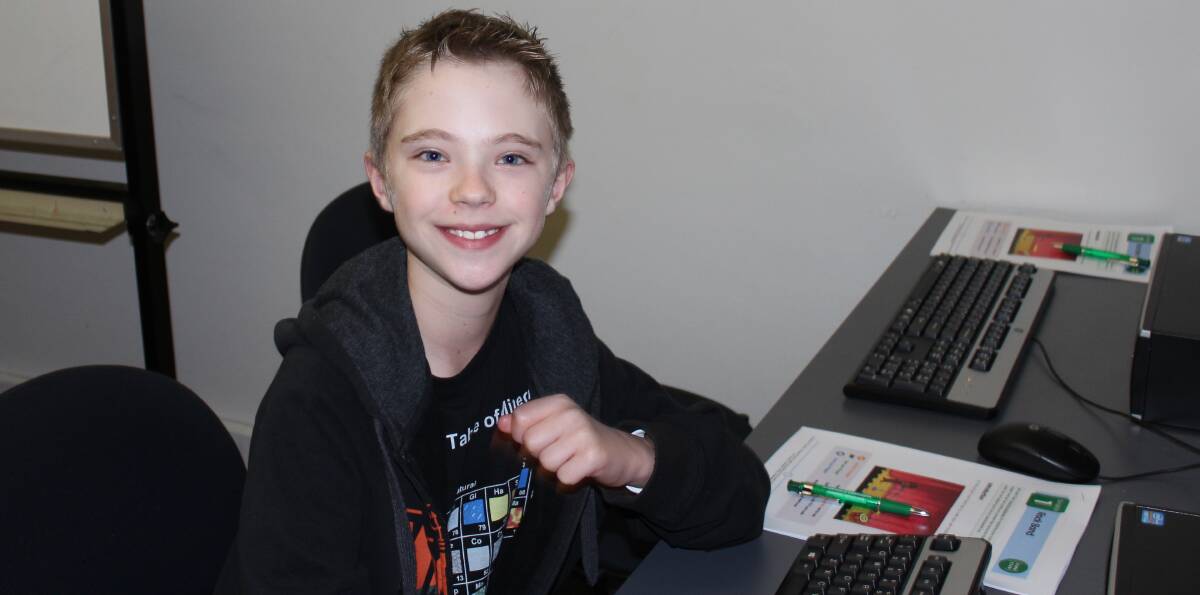 LEARNING: Nicholas Brazier took part in Code Club at Cessnock Library on Tuesday.