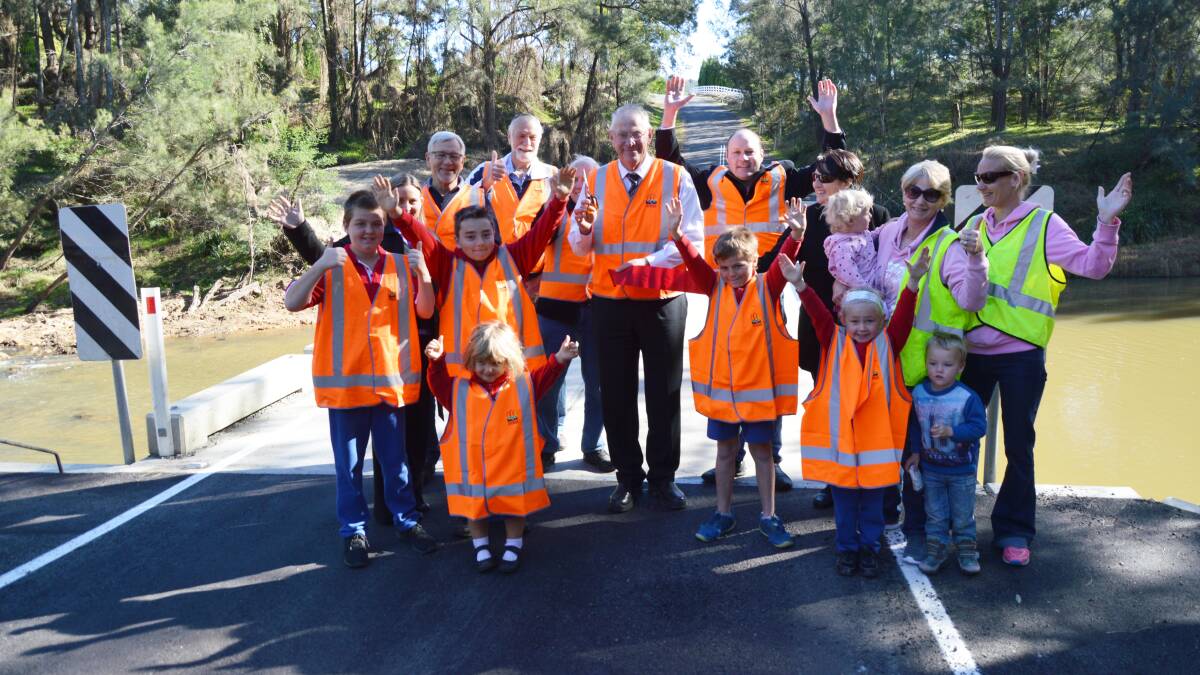 GREAT NEWS: Council representatives and students from Laguna Public School at the opening of the new Williams Bridge at Wollombi on July 26.