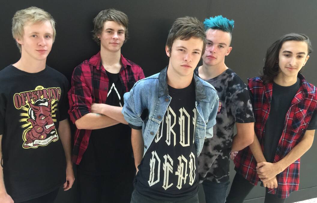 ON TOUR: From left, Kid Zr0 features Kurri Kurri's Bailey Graeber and Central Coast boys Jamie Bailey, Brandon Alexander, Lee Hackney and Jacob Richardson. The band will play at Weston Workers Club on February 5.