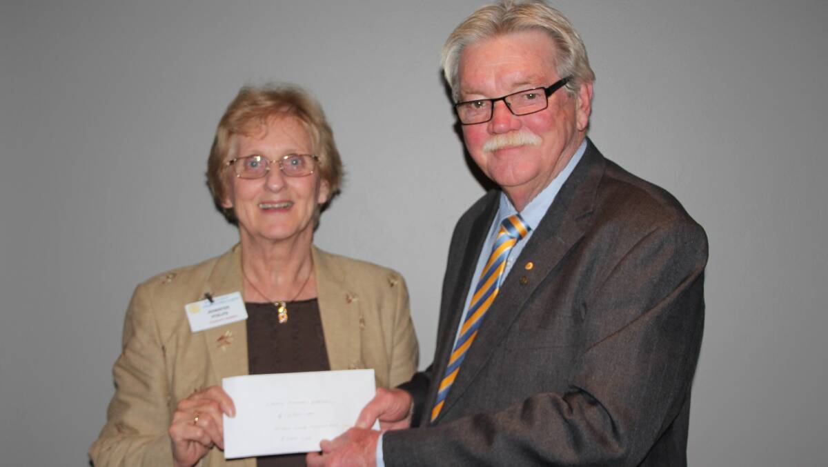 RECORD DONATIONS: Cessnock Wine Country Rotary Club treasurer, Bruce Wilson OAM presents the funds to Children’s Medical Research Institute community relations manager Jennifer Philps.