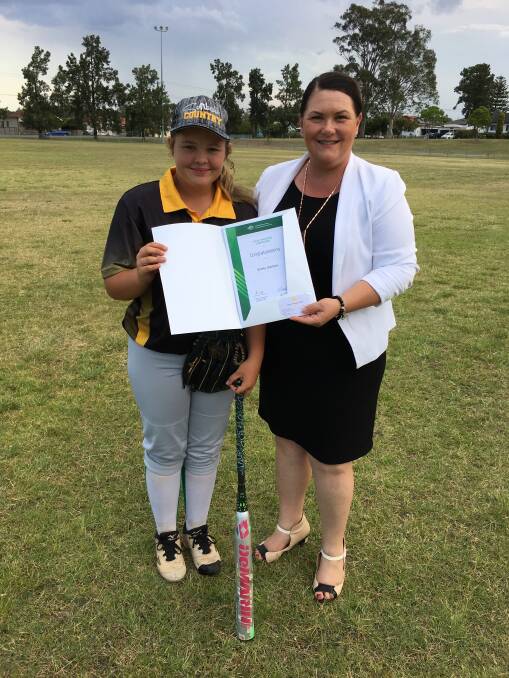 ACHIEVEMENT: Emily Gordon receives her Local Sporting Champions grant from Paterson MP Meryl Swanson.