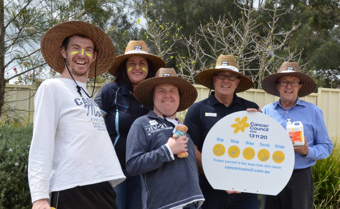 MESSAGE: Endeavour Group Australia's Luke Patterson, Sally Pereira and Nick Dilley, Cancer Council community relations coordinator Glen Parsons, and Endeavour CEO Greg Bourke at the sun safety presentation on September 22. Picture: LAURA BAIN