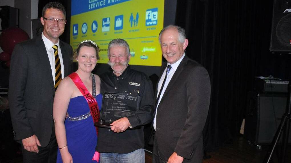 2012: Cessnock Leagues Club CEO Paul Cousins, Miss Cessnock City Hayley Doherty, overall winner Lenny Nicholson and chamber president Geoff Walker.