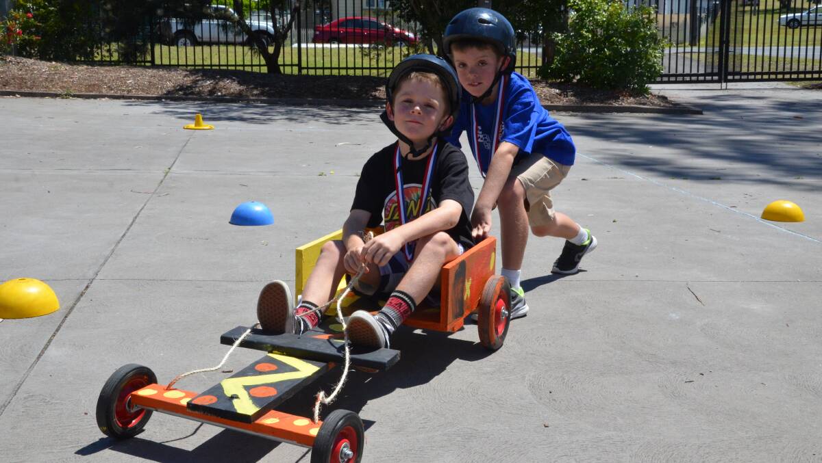 TEAM WORK: Twin brothers Jackson and Traie Foley won the Abermain Public School billy cart derby. Picture: Krystal Sellars