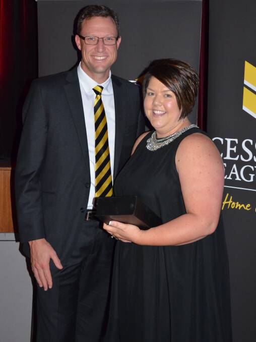 OUTSTANDING: Cessnock Leagues Club CEO Paul Cousins and overall winner Kristy Brady at the 2015 awards.
