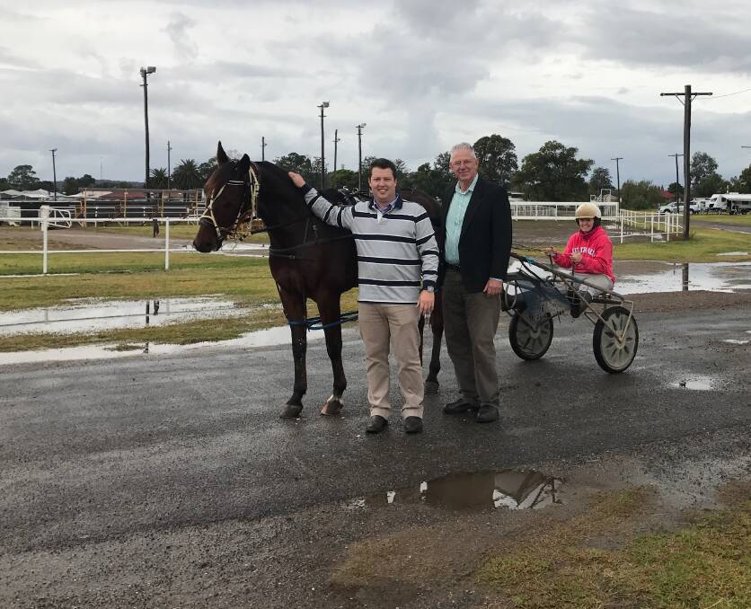 OPPORTUNITY: Cessnock councillor Jay Suvaal and mayor Bob Pynsent with harness racing driver Grace Harmey at Cessnock Showground.