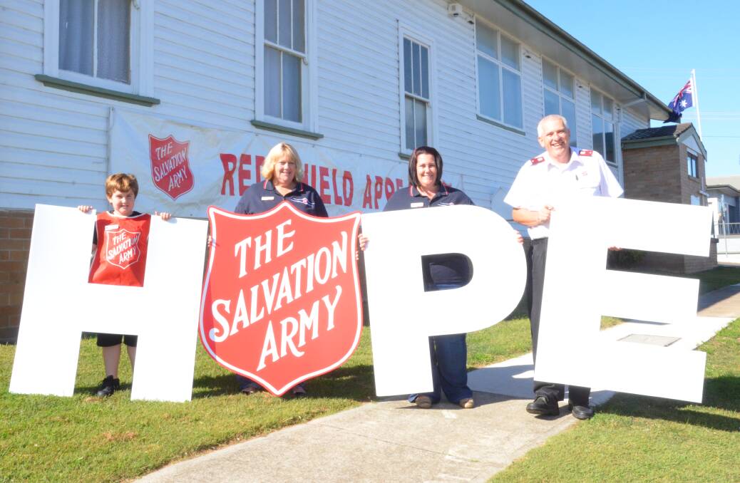 GIVE GENEROUSLY: Jackson Copeland, Leanne Lloyd, Erin Copeland and Darryn Lloyd from the Salvation Army Cessnock will be out and about this weekend for the Salvos' Red Shield Appeal. Picture: Krystal Sellars