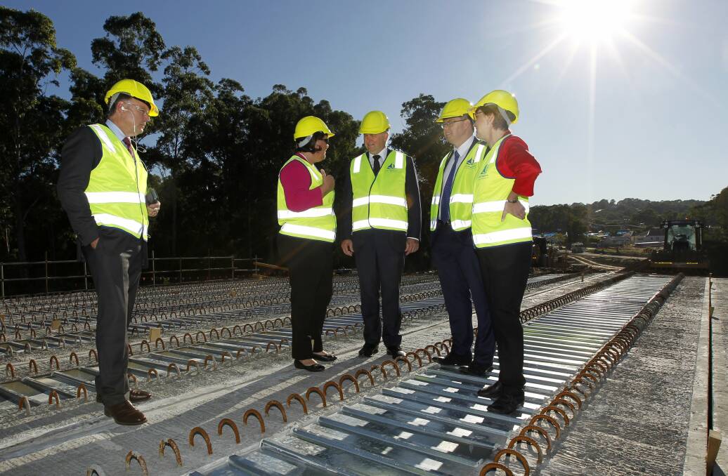 Labor MPs and candidates inspect the Glendale interchange during the federal election campaign. From left, Joel Fitzgibbon, Meryl Swanson, Anthony Albanese, Pat Conroy, and Jodie Harrison. Picture: JONATHAN CARROLL
