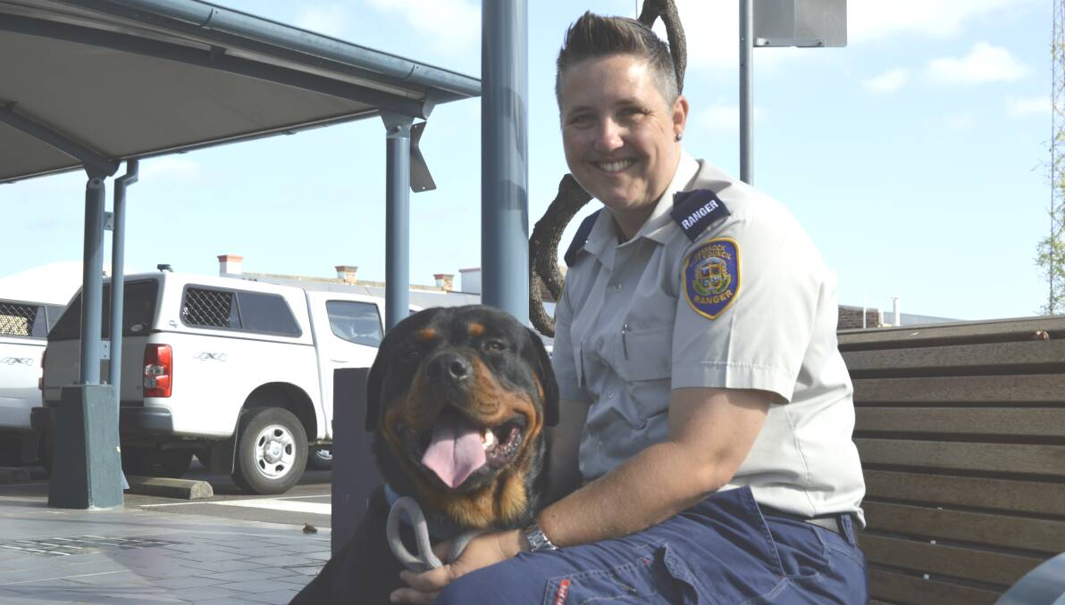 INITIATIVE: Cessnock City Council ranger Lyndall Smith with Kahn the Rottweiler at the council carpark, where the free microchipping day will be held on May 14.