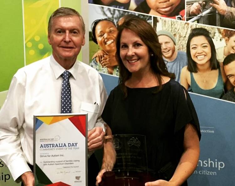 HONOURED: Strive for Autism's public officer Alan Baird and president Maxine Baird with the group's award for Community Event of the Year at Cessnock's 2017 Australia Day awards.