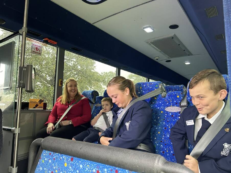 NSW Minister for Regional Transport and Roads Jenny Aitchison on board with students from East Maitland Public School - all wearing the seatbelts. Picture supplied