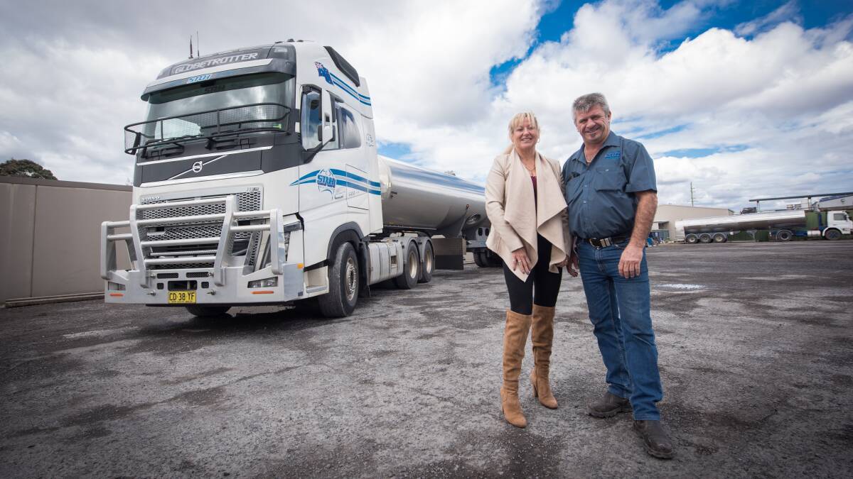 DRIVING SUCCESS: Regina and Scott Harvey, SRH Milk Haulage with one their Volvo trucks used in their successful milk cartage business - now the biggest in the country.
