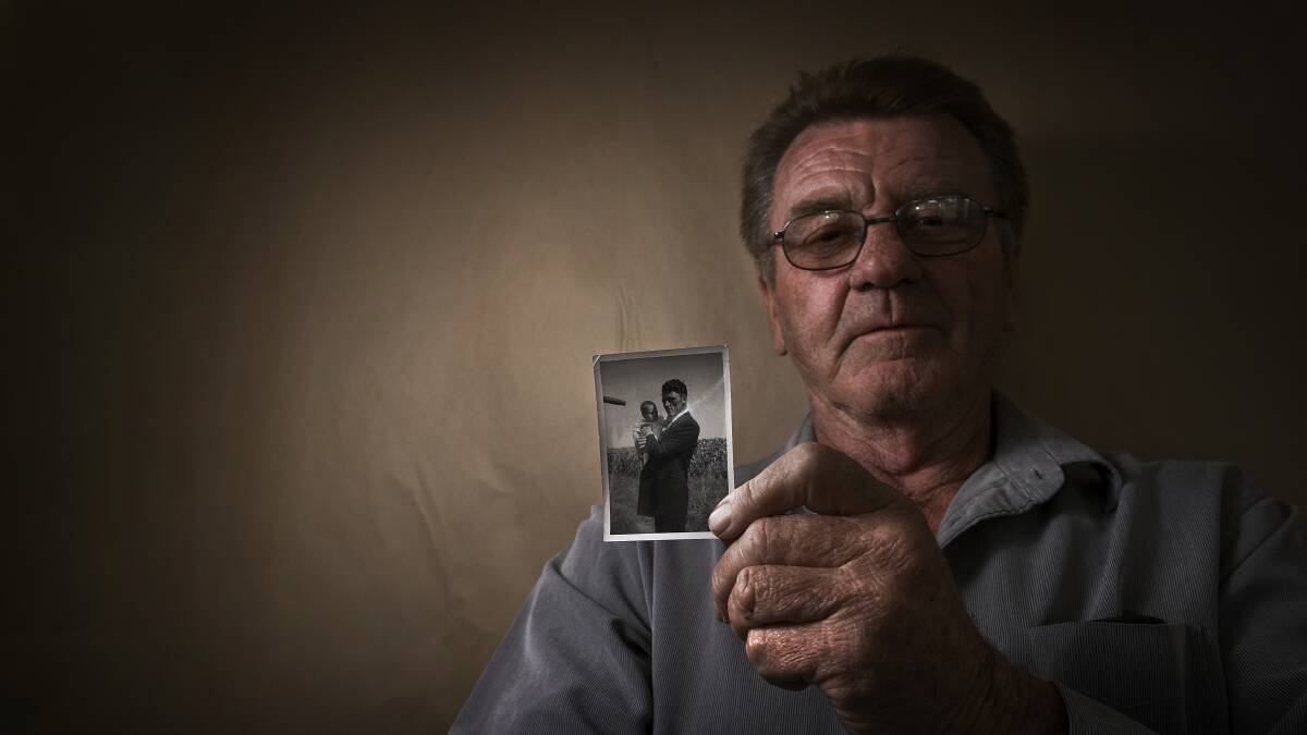 SEARCHING: Chris Fletcher holds a photo of his father, John Nelson Fletcher, who went missing in 1983. Chris promised his late mother he would try to find his father. Pictures: Perry Duffin