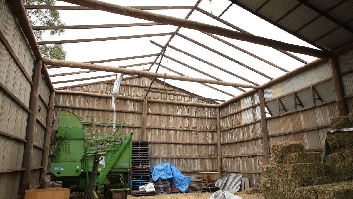 DAMAGE: The Woods' hay shed which lost its roof during the storm. Picture Max Mason-Hubers