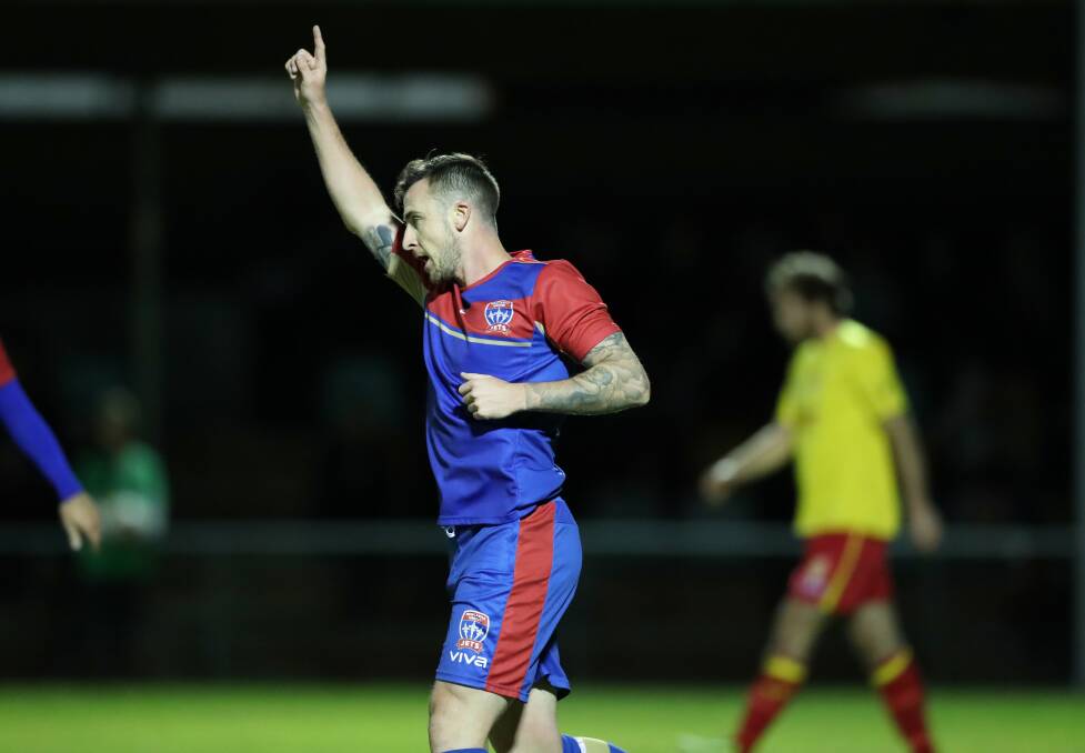 ON TARGET: Roy O'Donovan celebrates after scoring the Jets opening goal in a 5-1 win over Broadmeadow at Magic Park on Wednesday night. Picture: Sproule Sports Focus. 
