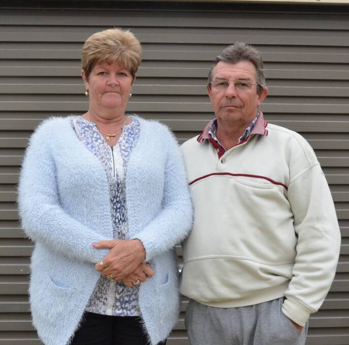 CRIME: Boomerang Street residents Vicki and James Brady in front of their shed, which was broken into and stolen from a few weeks ago.