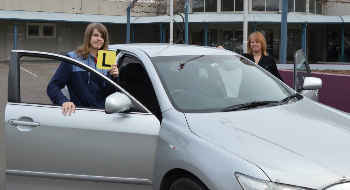 Learner driver Rhys Blake with his mother and supervising driver Yvonne Blake.