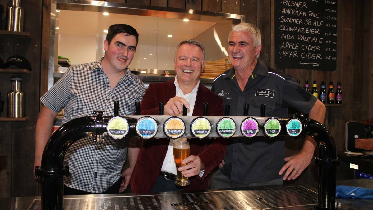 Hunter MP Joel Fitzgibbon (centre) with Ironbark Hill Brewhouse owners Andrew and Peter Drayton at the microbrewery's grand opening on April 28.