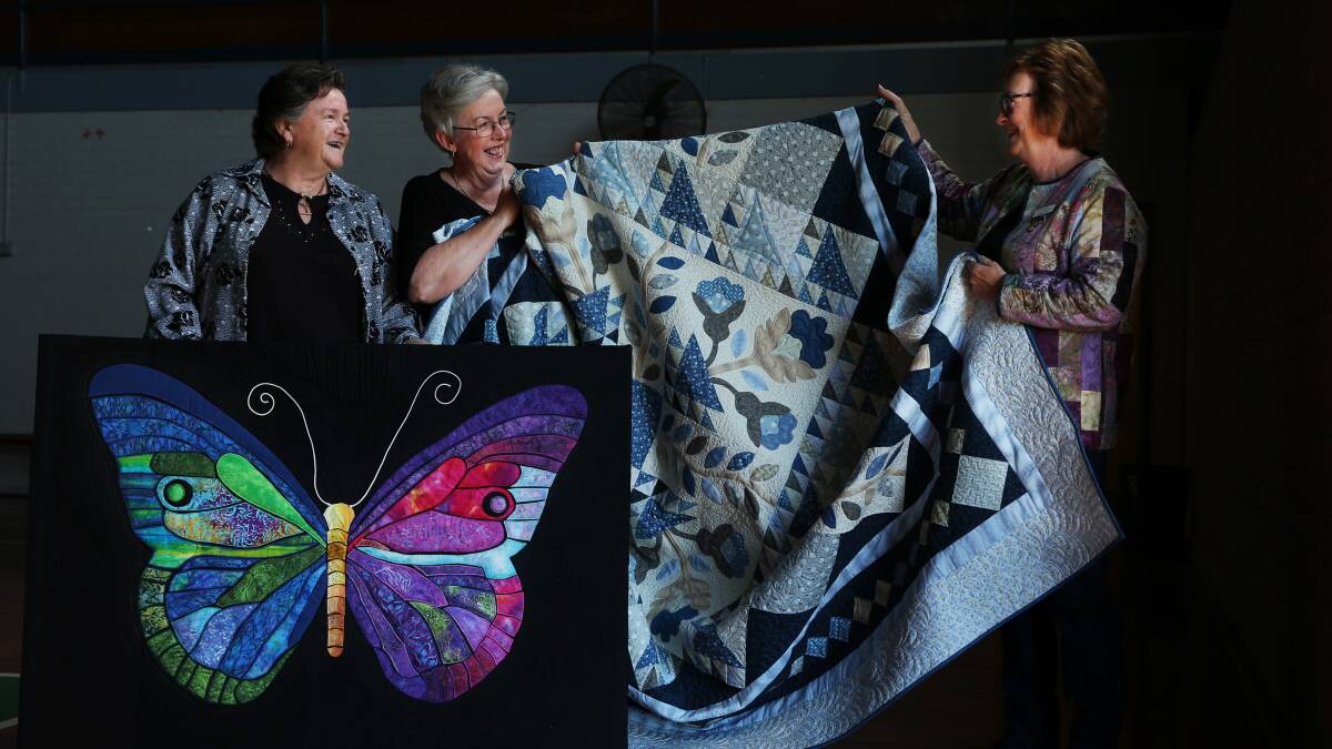 COLOURFUL: Cessnock Quilters and Embroiders member Debbie Thompson, secretary Christine Rae and president Susan Day. Picture: Simone De Peak