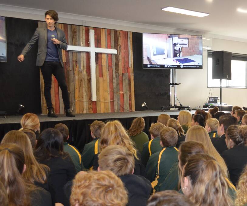 INSPIRING: Dr Jordan Nguyen addressing the students at St Philip's Christian College on Friday.
