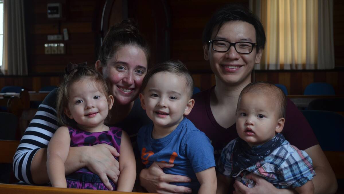 NEW CITIZENS: Vanessa and Robin Tso, Raymond Terrace, with Lauren, 2, Alistair, 3, and Benjamin, 1. Picture: Sam Norris