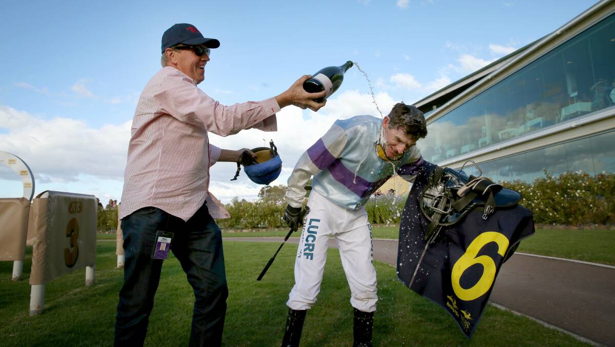 Jeremy Sylvester and Robert Thompson after the jockey rode his 4000th winner in 2014.
