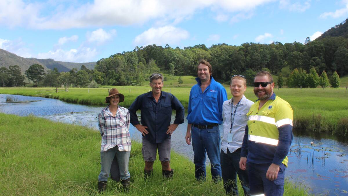 WATERTIGHT: (From left) Paxton residents Toni and Michael Lindley, Hunter Local Land Services representative Mick Budden and Daniel Livingston and Matt Hey of Hunter Water at Congewai Creek.