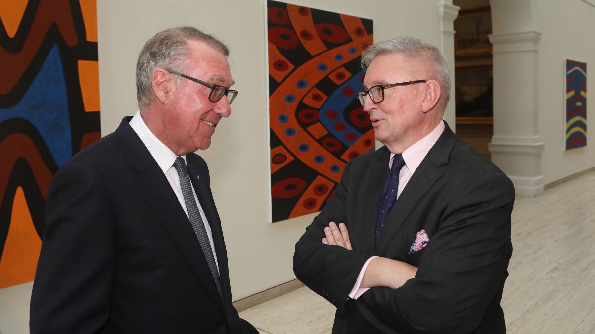 Art Gallery of NSW board president David Gonski (left) talks to Arts Minister Don Harwin at the announcement of the expansion of the Art Gallery of NSW on Wednesday. Picture: Daniel Munoz