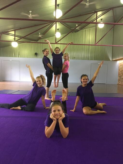 Winning moves: Young gymnasts are encouraged to have fun first in a supportive environment at Gymnastics 21.